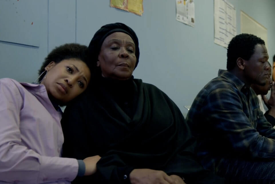 A group of people in the hospital waiting room